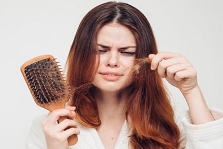 وز شدن موی خانم ها نشانه کمبود کدام ویتامین است؟